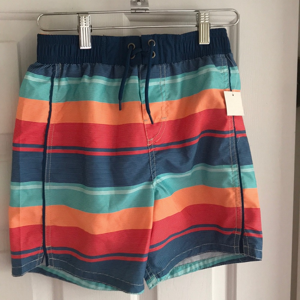 NWT boys swim trunks size 7